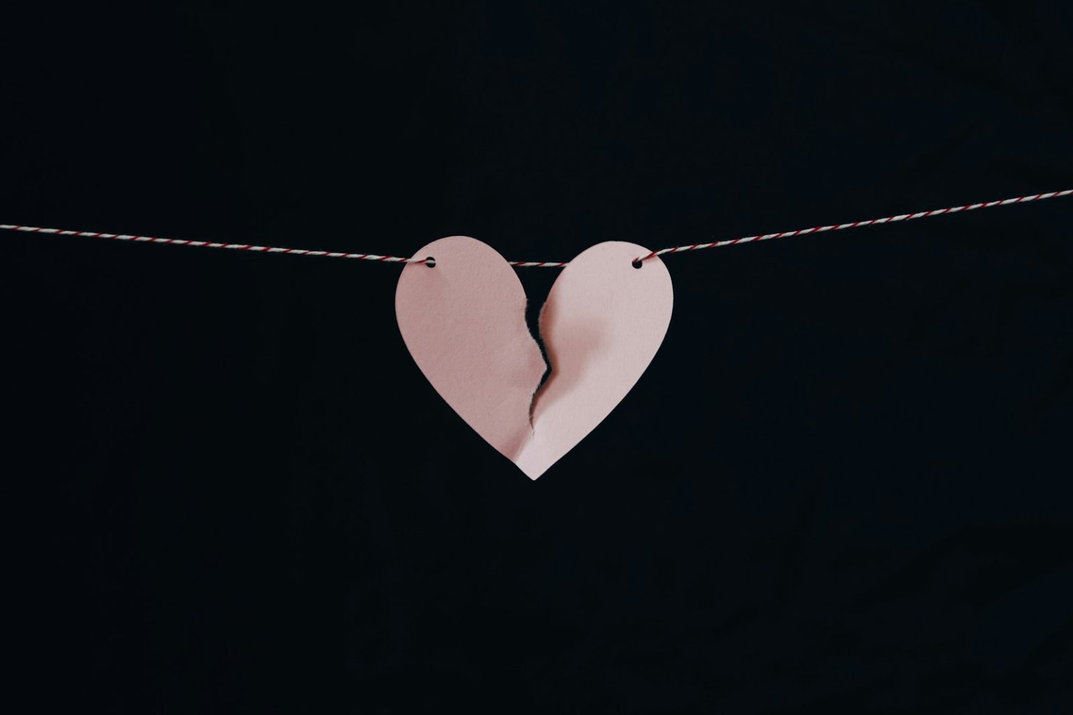 Photo by Kelly Sikkema broken heart hanging on wire