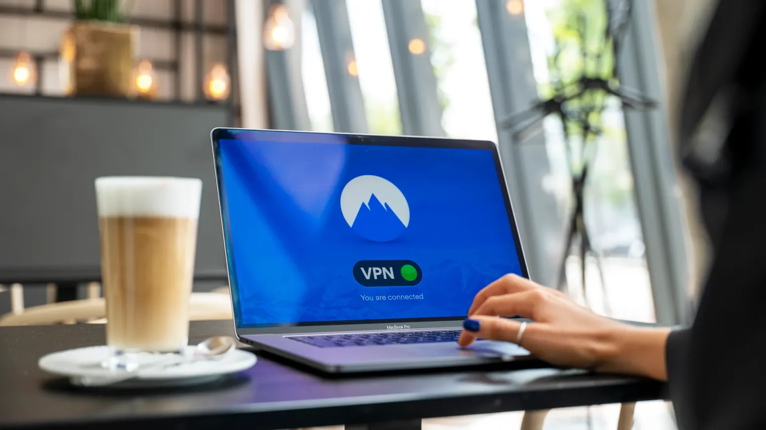 pexels-photo-5243611 Illustration of a small business network protected by VPN encryption and human cybersecurity monitoring