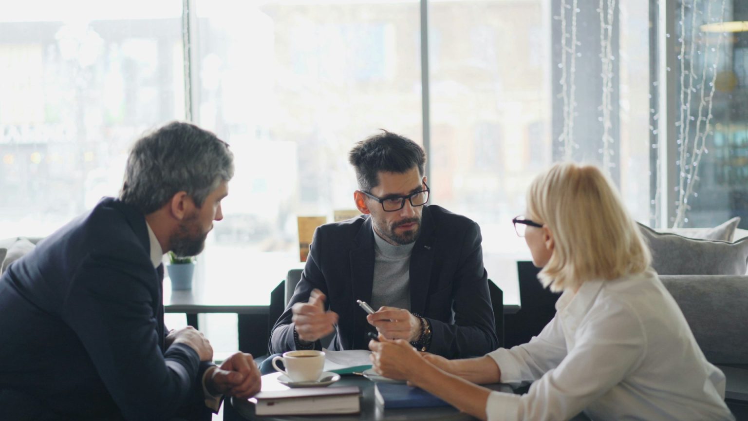 Self-employed lawyer client meeting Lawyer meeting clients in a professional setting