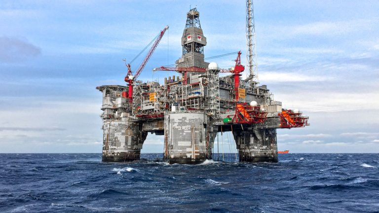 Offshore platform in the North Sea under a clear sky