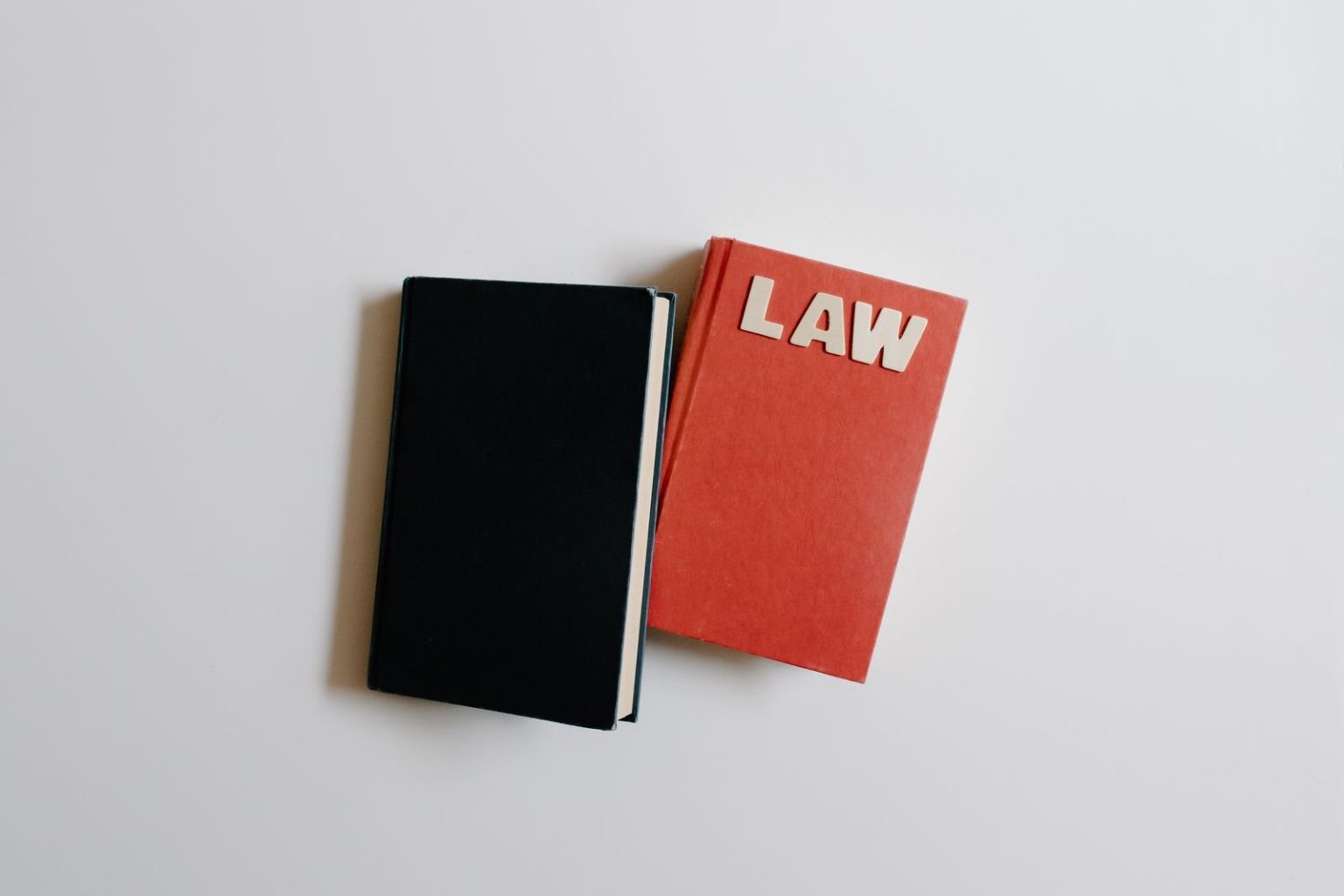 chambers-uk-2027-law-book Law book and notebook on a desk