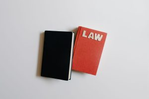 Law book and notebook on a desk