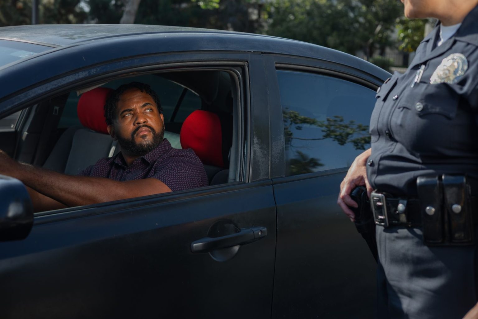 Kansas City DUI and Traffic Ticket Defense: Common Charges, Court Steps, and Driver Rights A police officer speaking to a driver during a traffic stop