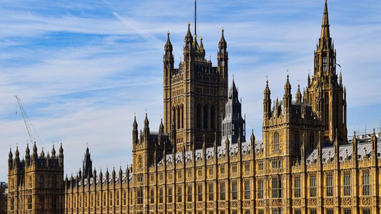 The Palace of Westminster in London under a clear blue sky The Palace of Westminster in London under a clear blue sky